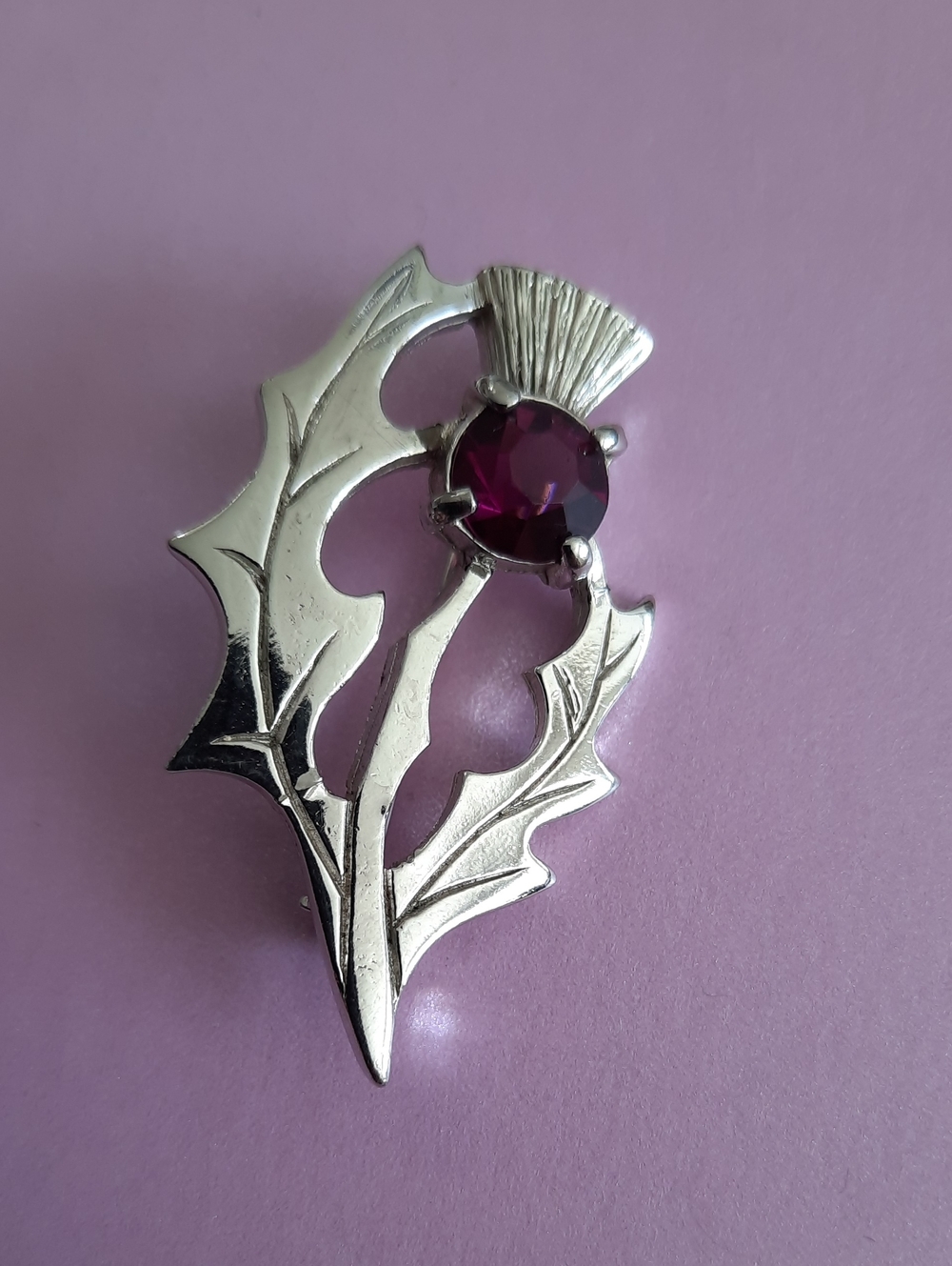 Silver-tone Thistle Brooch with Deep Purple Stone